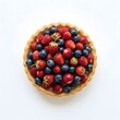 © KIMOG - Wild Berry Tartlet with Fresh Blueberries and Red Currants Isolated on White Background