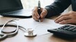 © lianlian liang - Healthcare professional drafting architectural medical plans with calculator and laptop on wooden workspace depicting clinic expansion investment and clinical layout strategy
