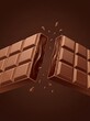 © Agata - Chocolate bar snapping in half with gooey liquid center
