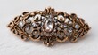 © Artittaya - Elegant vintage brooch with intricate metalwork and sparkling gemstones, perfect for jewelry lovers and fashion enthusiasts
