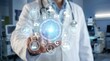 © Ada - Doctor using interactive digital medical interface in hospital clinic