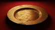 © Kokoj - Golden decorative plate on red background.