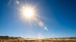 © your picture - Bright sun high in clear blue sky over rocky desert symbolizing harsh summer heat and drought