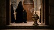 © Khoirul - Traditional incense burner with veiled women in the background, evoking a sense of solemnity and cultural heritage