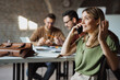 © Novak - Group of diverse business people working together in modern open plan office