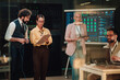 © Zamrznuti tonovi - It professionals analyzing data in server room, managing network security and maintaining digital infrastructure services