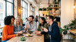 © D-stock photo - Group of diverse young friends enjoying coffee together in modern cafe