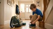 © _KUBE_ - A young schoolboy ties his shoelaces before leaving for school on a bright autumn morning. This everyday family routine reflects independence, preparation, and confidence for a successful school day.