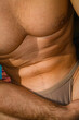 © Ivan Andrianov/Stocksy - Male Body Form And Skin Sunbathing Relax Activity
