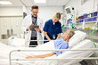 © Guille Faingold/Stocksy - Doc Examines Patient With Nurse