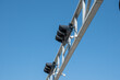 © Svetlana - Highway traffic lights against a clear blue sky. Symbol of transportation and road safety, showcasing urban infrastructure.