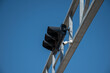 © Svetlana - Highway traffic lights against a clear blue sky.