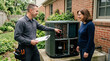 © Len_mik - HVAC technician explaining air conditioner repair to a female homeowner. Professional mechanic pointing at outdoor condenser unit during a residential service call