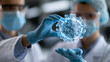 © Nataliya - Faceless healthcare worker in dark laboratory examining three-dimensional glowing digital rendering of virus structure focusing on virology and pandemic prevention research,