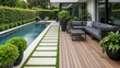 © Caven - Luxurious modern backyard patio with swimming pool and lounge area