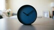 © Rasel - Minimalist Modern Desk Clock with Dark Blue Face and Black Hands in Home Interior