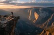 © SilentSmog - Backlit person standing on a mountain precipice looking out over a expansive canyon landscape at sunset with mountain adventure landscape wilderness exploration standing vertical mountainous