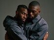 © BlackBridge Media - Two Men Embracing in Intimate Moment Together