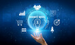 © InfiniteFlow - Global Business Model Concept with Hand Reaching for a Light Bulb and Various Icons Representing Finance and Strategy in a Digital Environment Quark.