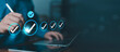 © ภัทรชัย รัตนชัยวงค์ - Business professional completing a digital checklist on a virtual interface, symbolizing quality assurance, compliance, audit, verification, workflow productivity, and successful task management.