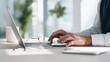 © Anna - Senior hands using laptop and mouse for remote work business concept for website banner and marketing design