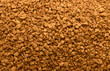 © Михаил Шорохов - Instant coffee granules static, in unknown, with instant coffee granules, with coffee granules texture, from a top-down perspective, with brown, orange accents.