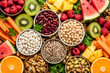 © Abdelati - Healthy plant based food assortment, vibrant vegan nutrition with legumes and fresh fruit, top view of fiber rich superfoods and organic snacks isolated on White Background ai