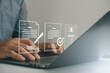 © MUNTHITA - Businessman using laptop with digital user profile form. Secure signup process, account creation, identity verification, paperless system, enrollment for business platform. Online registration concept