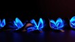 © antishock - Blue flames rise from burners. Dark background emphasizes glowing heat, creating dramatic visual effect. Minimalist composition.