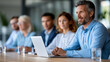 © Nataliya - Faceless collaborative team meeting in modern office environment with diverse professionals around conference table, corporate teamwork concept, business meeting photography,