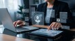 © MW Studio  - Business professional using laptop and tablet with AI recruitment interface, digital HR analytics and candidate screening