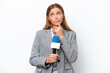 © luismolinero - Young caucasian tv presenter woman isolated on white background having doubts while looking up