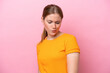 © luismolinero - Young caucasian woman wearing band aid isolated on pink background with sad expression