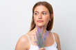 © luismolinero - Young caucasian woman isolated on white background holding a lavender plant. Close up portrait