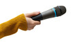 © Vetle - Hand holding a professional microphone with blue accent ring