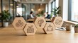 © Irfan - Business meeting with wooden hexagonal icons on office table