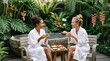© Анастасия Макевич - Two women enjoying tea in a lush tropical spa garden, embracing wellness, relaxation and luxury travel experiences