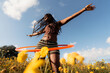 © Lucas Ottone/Stocksy - Hula Hooping in a Field of Flowers on a Sunny Afternoon