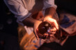 © ADDICTIVE STOCK - Latin woman holding crystal ball in esoteric ritual light