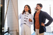 © ADDICTIVE STOCK - Coworking team planning strategy at office whiteboard