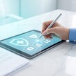 © Sam Efendi - Healthcare Professional Using Digital Tablet for Insurance Policy Management and Electronic Medical Record Processing in Clinic Office