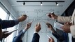 © ShortFilmStock - Business team brainstorming strategy on glass whiteboard, corporate planning meeting with hands writing diagrams and flowcharts, teamwork and management concept in office.