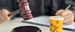© Nadzeya - Court proceeding involving prescription medications and a judge gavel during a legal