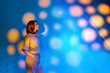 © VISTA by Westend61 - Woman explores surreal augmented reality concept indoors
