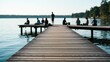 © CrazyJuke - Serene Lakeside Fishing: A group of people enjoy a peaceful afternoon fishing from a wooden pier on a calm lake, surrounded by a lush forest under a clear sky.