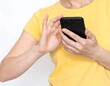 © Motoko - 連絡をするため、スマホを操作