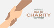 © AG Design - International Day of Charity, hands holding globe