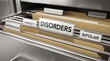 © Stock iT - Mental health disorders filing cabinet folders with labels for depression anxiety and bipolar for a medical website.