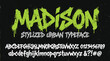 © Iconify Studio - Madison stylized urban typeface with graffiti drip effect, neon green street art font vector, edgy grunge alphabet and numbers set