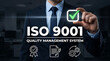 © Top seller  - Businessman touching virtual checkmark with ISO 9001 quality management system text